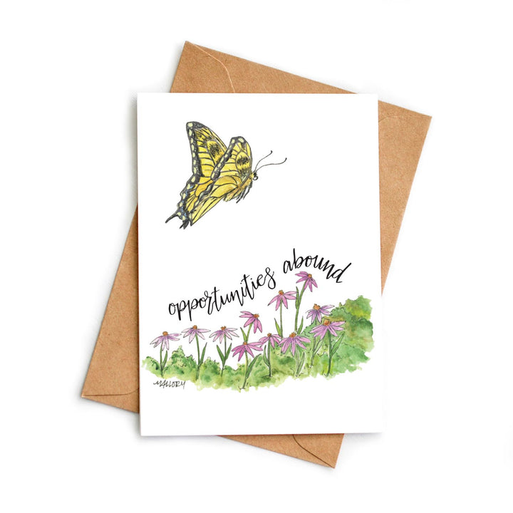 Greeting card with a butterfly and flowers design, featuring the text 'opportunities abound'.