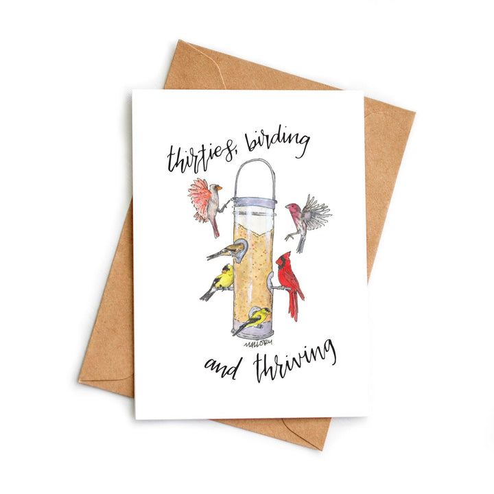 Greeting card with bird illustration and 'thirties, birding and thriving' text on a white background.